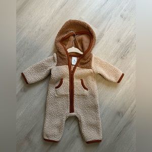 Cute Sherpa zip up suit perfect for the winter